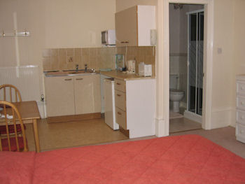 Studio kitchen and bathroom area